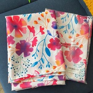 Two Floral Multicolor Tablecloths plus 8 Napkins